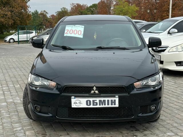 Чорний Міцубісі Lancer, об'ємом двигуна 2 л та пробігом 239 тис. км за 6900 $, фото 1 на Automoto.ua