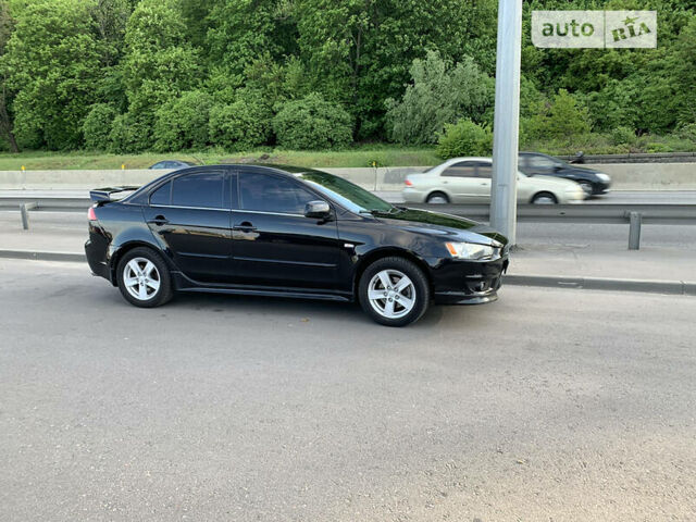 Чорний Міцубісі Lancer, об'ємом двигуна 2 л та пробігом 230 тис. км за 7500 $, фото 3 на Automoto.ua