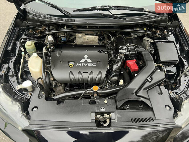 Чорний Міцубісі Lancer, об'ємом двигуна 2 л та пробігом 216 тис. км за 7150 $, фото 16 на Automoto.ua