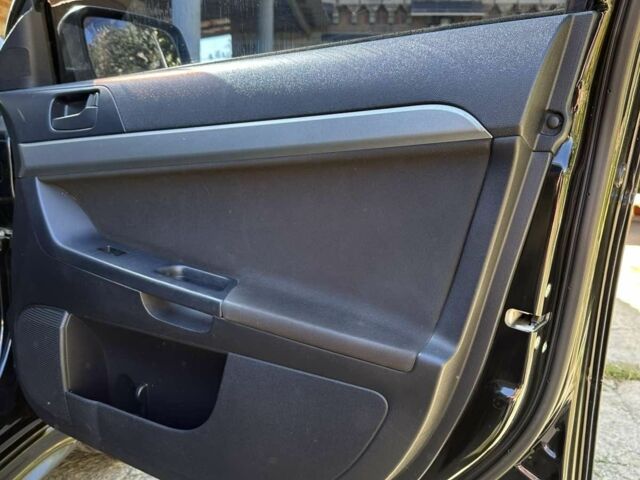 Чорний Міцубісі Lancer, об'ємом двигуна 2 л та пробігом 230 тис. км за 6650 $, фото 16 на Automoto.ua