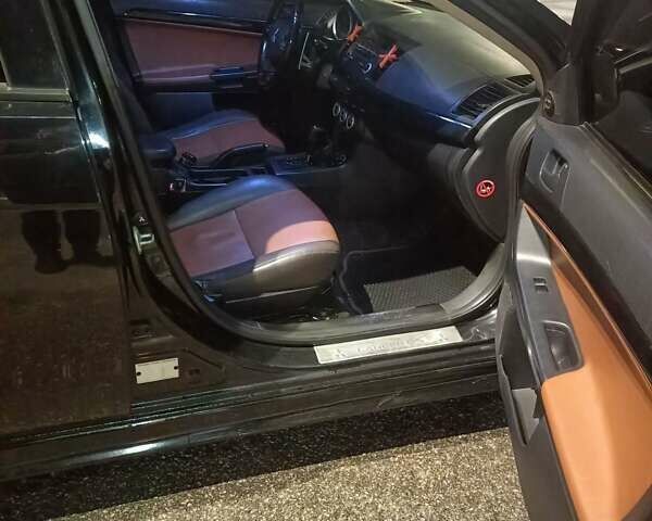 Черный Мицубиси Лансер, объемом двигателя 2 л и пробегом 240 тыс. км за 6400 $, фото 13 на Automoto.ua