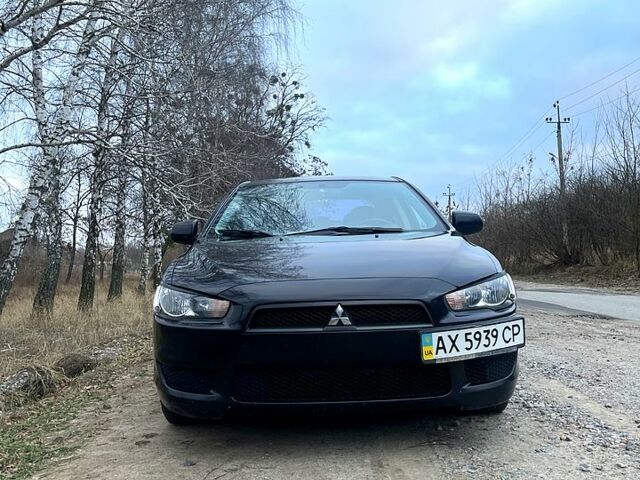 Чорний Міцубісі Lancer, об'ємом двигуна 1.5 л та пробігом 183 тис. км за 6400 $, фото 9 на Automoto.ua