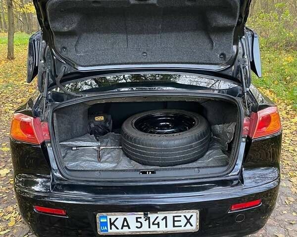 Чорний Міцубісі Lancer, об'ємом двигуна 2 л та пробігом 237 тис. км за 7500 $, фото 11 на Automoto.ua