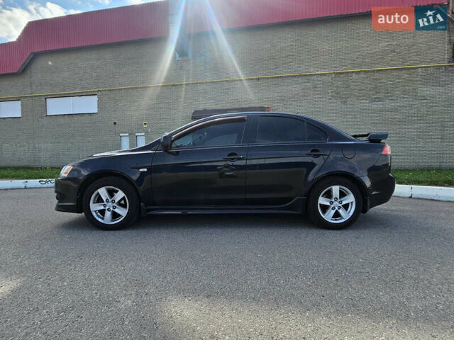 Чорний Міцубісі Lancer, об'ємом двигуна 2 л та пробігом 249 тис. км за 6500 $, фото 5 на Automoto.ua