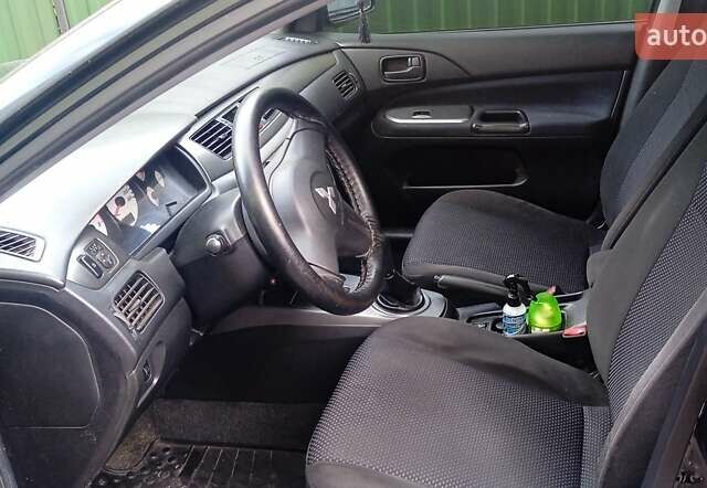 Мицубиси Лансер 2008 в Тернополе на Automoto.ua Черный Мицубиси Лансер, объемом двигателя 1.58 л и пробегом 110 тыс. км за 4900 $, фото 1 на Automoto.ua