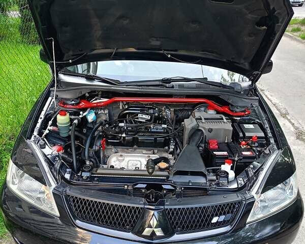 Мицубиси Лансер 2008 в Львове на Automoto.ua Черный Мицубиси Лансер, объемом двигателя 1.58 л и пробегом 200 тыс. км за 5200 $, фото 151 на Automoto.ua