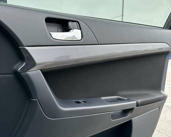 Чорний Міцубісі Lancer, об'ємом двигуна 2 л та пробігом 199 тис. км за 7900 $, фото 39 на Automoto.ua