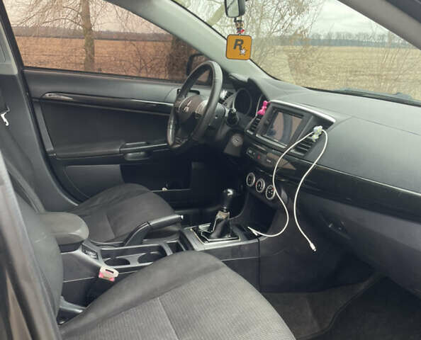 Чорний Міцубісі Lancer, об'ємом двигуна 2 л та пробігом 280 тис. км за 4400 $, фото 8 на Automoto.ua