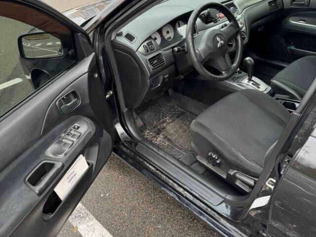 Чорний Міцубісі Lancer, об'ємом двигуна 1.6 л та пробігом 245 тис. км за 4500 $, фото 14 на Automoto.ua
