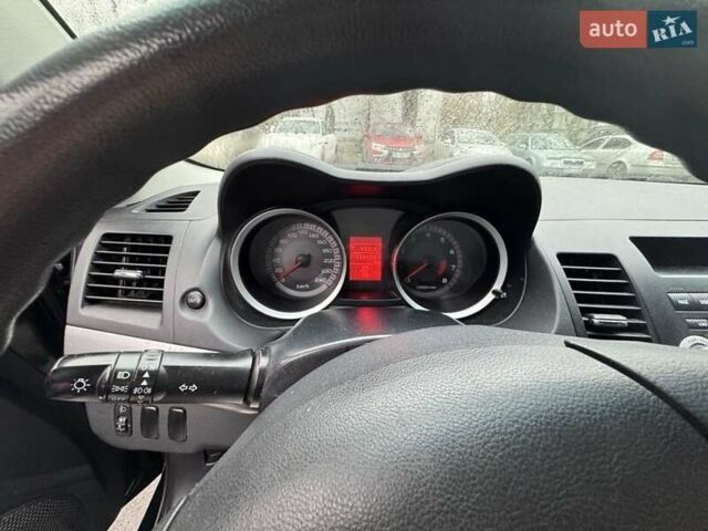 Черный Мицубиси Лансер, объемом двигателя 1.5 л и пробегом 126 тыс. км за 6499 $, фото 4 на Automoto.ua