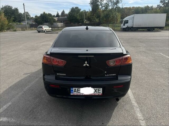 Чорний Міцубісі Lancer, об'ємом двигуна 2 л та пробігом 221 тис. км за 5500 $, фото 3 на Automoto.ua