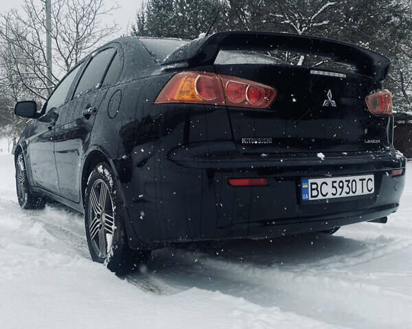 Черный Мицубиси Лансер, объемом двигателя 1.5 л и пробегом 280 тыс. км за 5200 $, фото 6 на Automoto.ua
