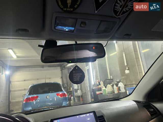 Черный Мицубиси Лансер, объемом двигателя 2 л и пробегом 200 тыс. км за 8000 $, фото 6 на Automoto.ua