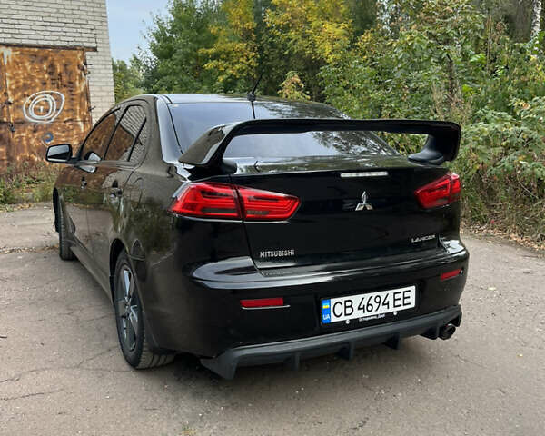 Мицубиси Лансер 2008 в Чернигове на Automoto.ua Черный Мицубиси Лансер, объемом двигателя 2 л и пробегом 254 тыс. км за 7500 $, фото 5 на Automoto.ua