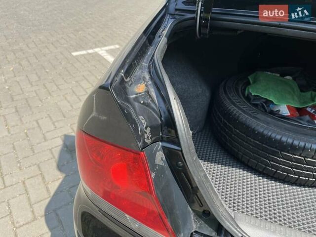 Чорний Міцубісі Lancer, об'ємом двигуна 1.6 л та пробігом 296 тис. км за 4200 $, фото 52 на Automoto.ua