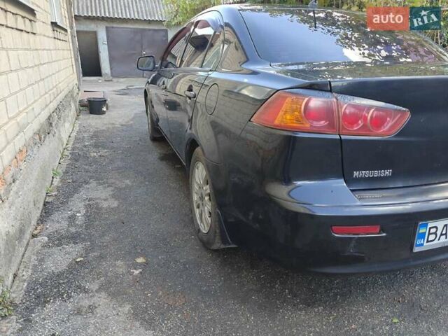 Мицубиси Лансер 2008 в Добровеличковке на Automoto.ua Черный Мицубиси Лансер, объемом двигателя 1.5 л и пробегом 175 тыс. км за 5500 $, фото 2 на Automoto.ua