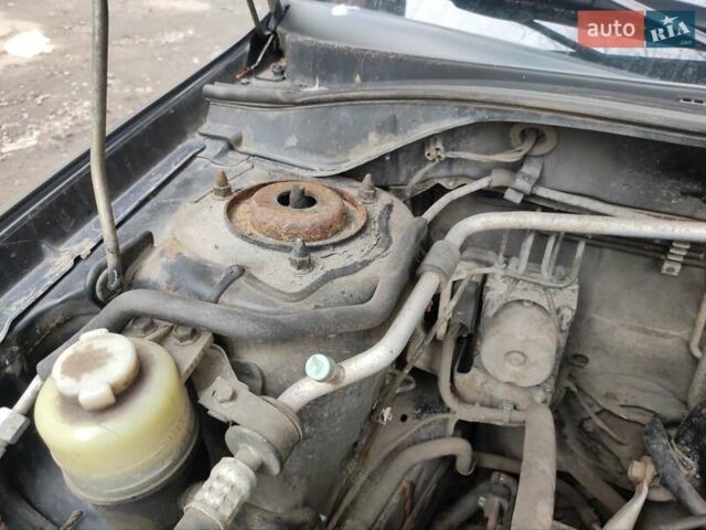 Чорний Міцубісі Lancer, об'ємом двигуна 1.6 л та пробігом 335 тис. км за 3100 $, фото 3 на Automoto.ua