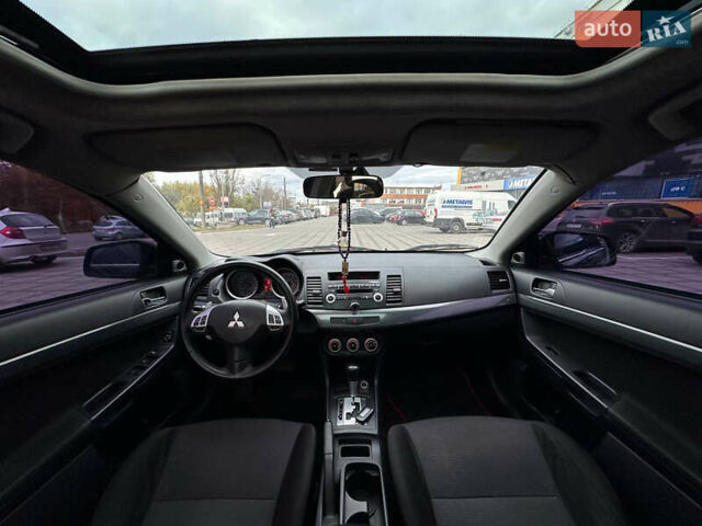 Черный Мицубиси Лансер, объемом двигателя 2 л и пробегом 236 тыс. км за 7950 $, фото 11 на Automoto.ua
