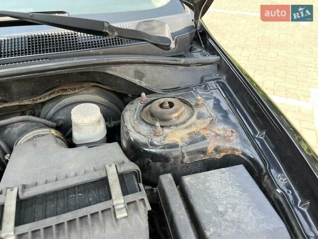 Чорний Міцубісі Lancer, об'ємом двигуна 1.6 л та пробігом 296 тис. км за 4200 $, фото 10 на Automoto.ua