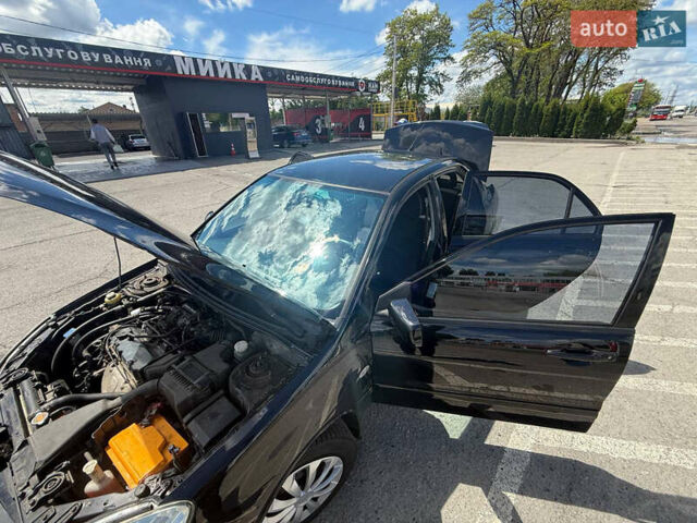 Чорний Міцубісі Lancer, об'ємом двигуна 1.6 л та пробігом 292 тис. км за 3600 $, фото 15 на Automoto.ua