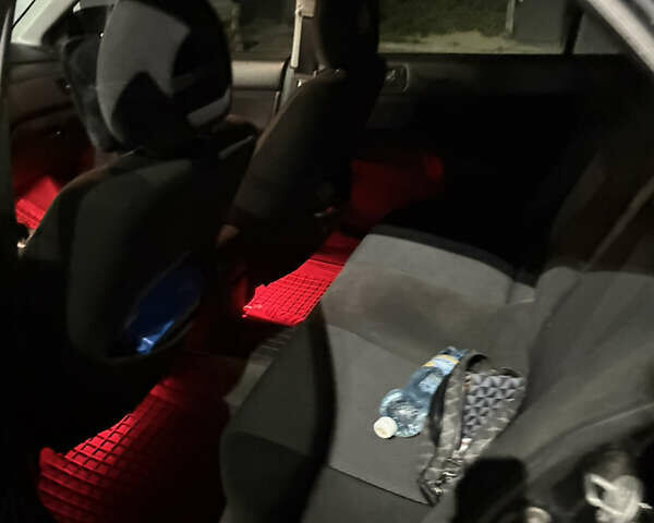Черный Мицубиси Лансер, объемом двигателя 1.58 л и пробегом 230 тыс. км за 4300 $, фото 18 на Automoto.ua