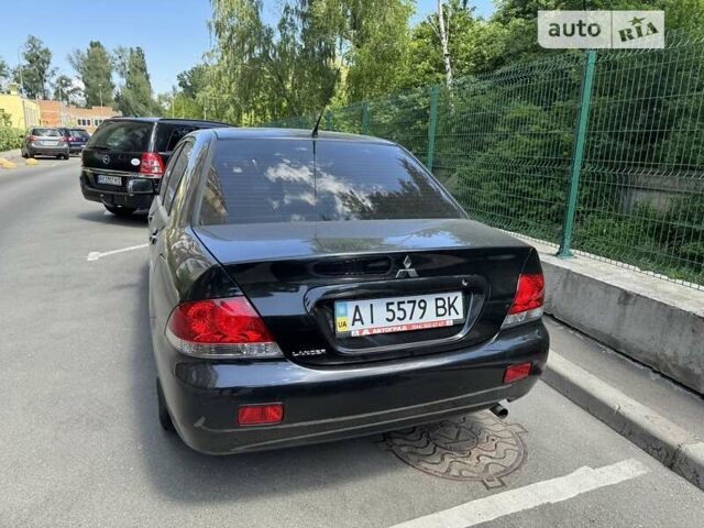 Чорний Міцубісі Lancer, об'ємом двигуна 1.6 л та пробігом 78 тис. км за 3999 $, фото 2 на Automoto.ua