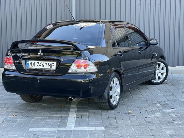 Міцубісі Lancer 2008 у Синельниковом на Automoto.ua Чорний Міцубісі Lancer, об'ємом двигуна 1.6 л та пробігом 230 тис. км за 4500 $, фото 8 на Automoto.ua
