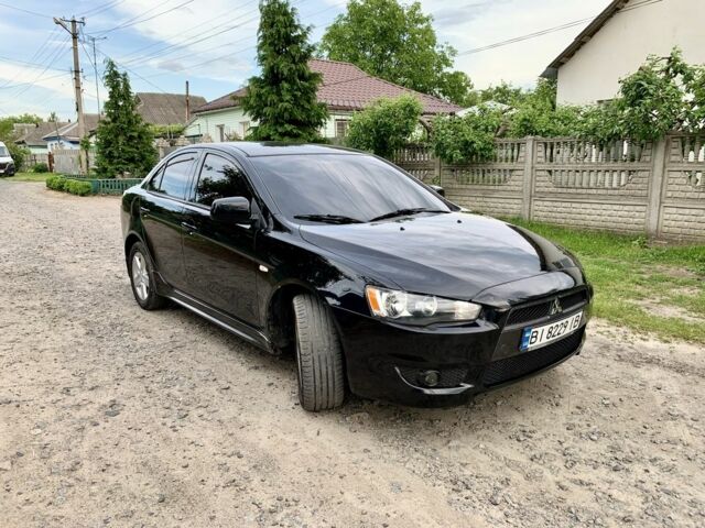 Чорний Міцубісі Lancer, об'ємом двигуна 2 л та пробігом 242 тис. км за 7000 $, фото 2 на Automoto.ua