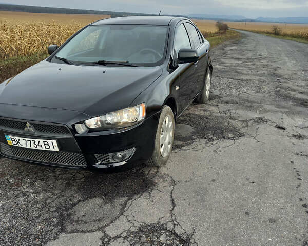 Чорний Міцубісі Lancer, об'ємом двигуна 1.5 л та пробігом 160 тис. км за 5850 $, фото 1 на Automoto.ua