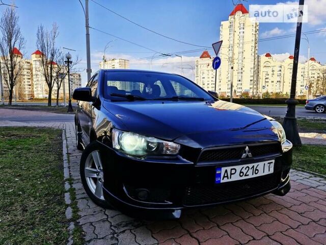 Чорний Міцубісі Lancer, об'ємом двигуна 2 л та пробігом 182 тис. км за 7650 $, фото 17 на Automoto.ua