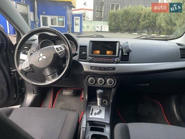 Чорний Міцубісі Lancer, об'ємом двигуна 2 л та пробігом 217 тис. км за 5800 $, фото 10 на Automoto.ua