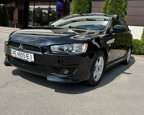 Чорний Міцубісі Lancer, об'ємом двигуна 2 л та пробігом 217 тис. км за 7800 $, фото 10 на Automoto.ua