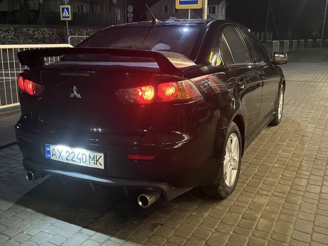 Черный Мицубиси Лансер, объемом двигателя 2 л и пробегом 270 тыс. км за 5600 $, фото 2 на Automoto.ua