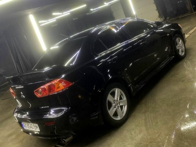Чорний Міцубісі Lancer, об'ємом двигуна 2 л та пробігом 126 тис. км за 5800 $, фото 4 на Automoto.ua