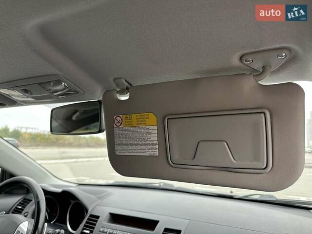 Чорний Міцубісі Lancer, об'ємом двигуна 2 л та пробігом 199 тис. км за 7900 $, фото 41 на Automoto.ua