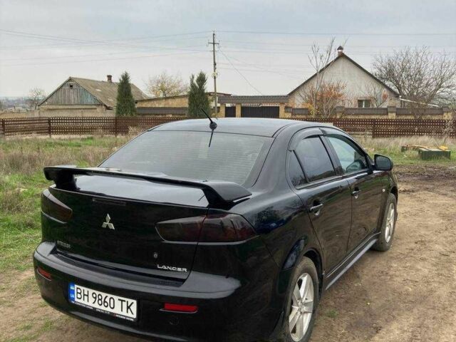 Чорний Міцубісі Lancer, об'ємом двигуна 2 л та пробігом 180 тис. км за 7500 $, фото 1 на Automoto.ua