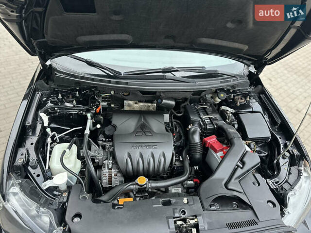 Чорний Міцубісі Lancer, об'ємом двигуна 1.5 л та пробігом 111 тис. км за 6999 $, фото 72 на Automoto.ua