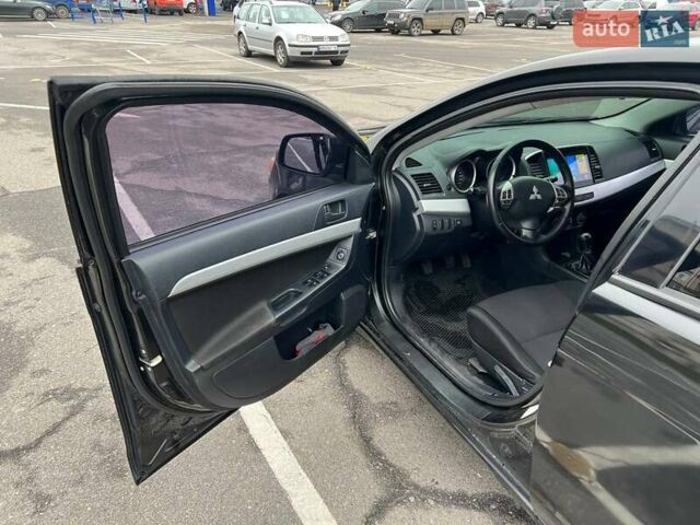 Черный Мицубиси Лансер, объемом двигателя 1.5 л и пробегом 225 тыс. км за 5100 $, фото 15 на Automoto.ua