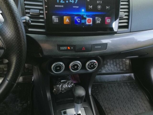 Міцубісі Lancer 2008 у Києві на Automoto.ua Чорний Міцубісі Lancer, об'ємом двигуна 2 л та пробігом 196 тис. км за 5500 $, фото 22 на Automoto.ua