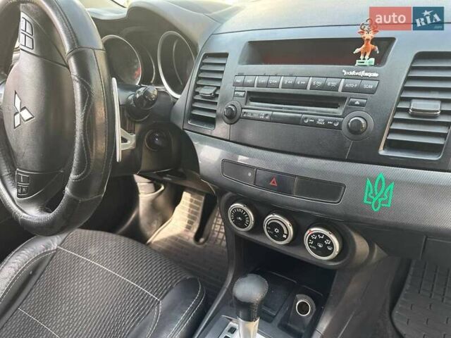 Чорний Міцубісі Lancer, об'ємом двигуна 2 л та пробігом 278 тис. км за 6600 $, фото 7 на Automoto.ua