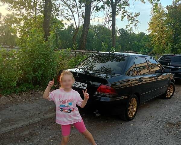 Мицубиси Лансер 2008 в Львове на Automoto.ua Черный Мицубиси Лансер, объемом двигателя 1.58 л и пробегом 200 тыс. км за 5200 $, фото 210 на Automoto.ua