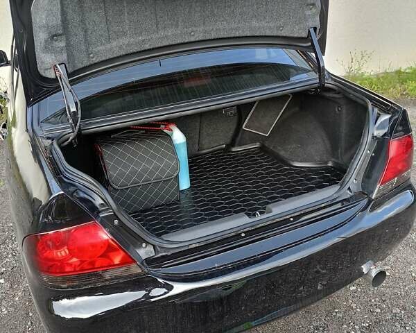Мицубиси Лансер 2008 в Львове на Automoto.ua Черный Мицубиси Лансер, объемом двигателя 1.58 л и пробегом 200 тыс. км за 5200 $, фото 225 на Automoto.ua