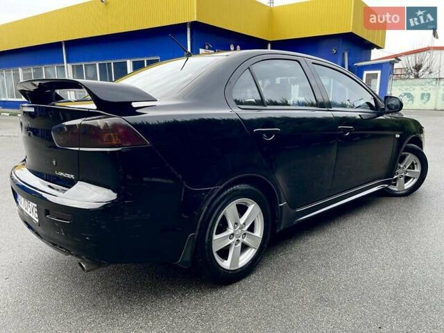 Чорний Міцубісі Lancer, об'ємом двигуна 2 л та пробігом 217 тис. км за 5800 $, фото 6 на Automoto.ua