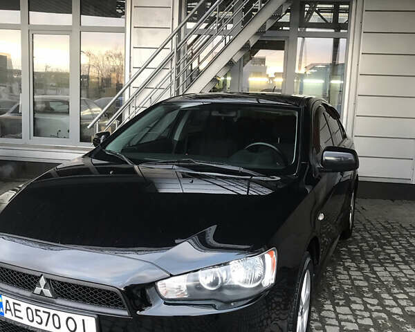 Черный Мицубиси Лансер, объемом двигателя 2 л и пробегом 200 тыс. км за 8000 $, фото 27 на Automoto.ua
