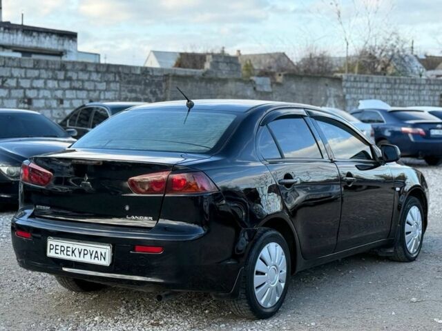 Чорний Міцубісі Lancer, об'ємом двигуна 1.5 л та пробігом 220 тис. км за 4600 $, фото 4 на Automoto.ua