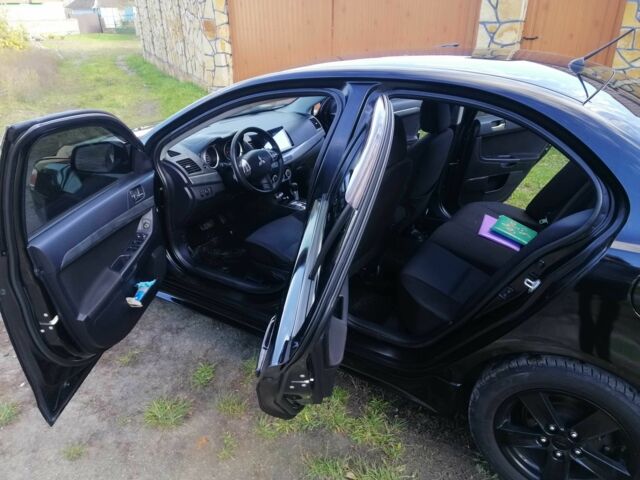 Міцубісі Lancer 2008 у Києві на Automoto.ua Чорний Міцубісі Lancer, об'ємом двигуна 2 л та пробігом 196 тис. км за 5500 $, фото 14 на Automoto.ua