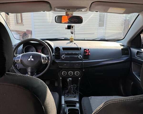 Чорний Міцубісі Lancer, об'ємом двигуна 2 л та пробігом 150 тис. км за 6500 $, фото 7 на Automoto.ua
