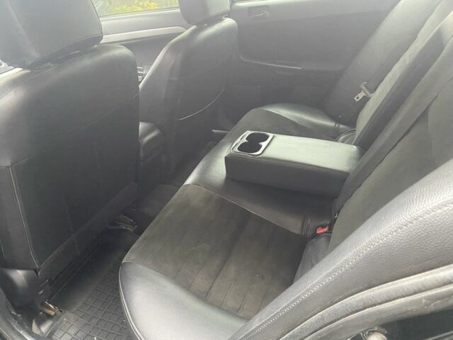 Черный Мицубиси Лансер, объемом двигателя 2 л и пробегом 190 тыс. км за 3100 $, фото 7 на Automoto.ua