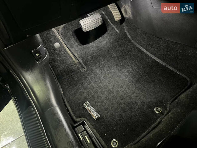 Черный Мицубиси Лансер, объемом двигателя 2 л и пробегом 200 тыс. км за 8000 $, фото 8 на Automoto.ua