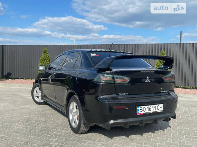 Чорний Міцубісі Lancer, об'ємом двигуна 2 л та пробігом 178 тис. км за 7500 $, фото 4 на Automoto.ua